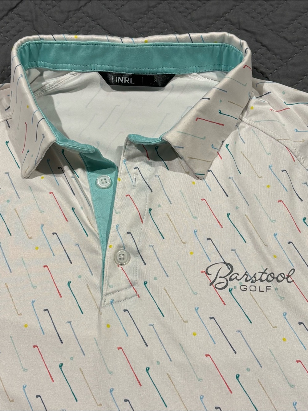 UNRL Barstool Golf Men's White Golf Club Patterned Polo with Teal Trim
